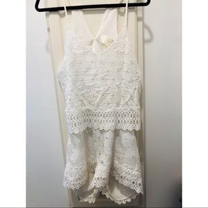 Lace romper with adorable back